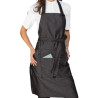 Stain-resistant black apron with bib and crossed straps.